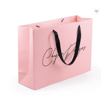 Повторно использованные сумки товара глянцевой бумаги для покупок подарка с персонализированным логотипом